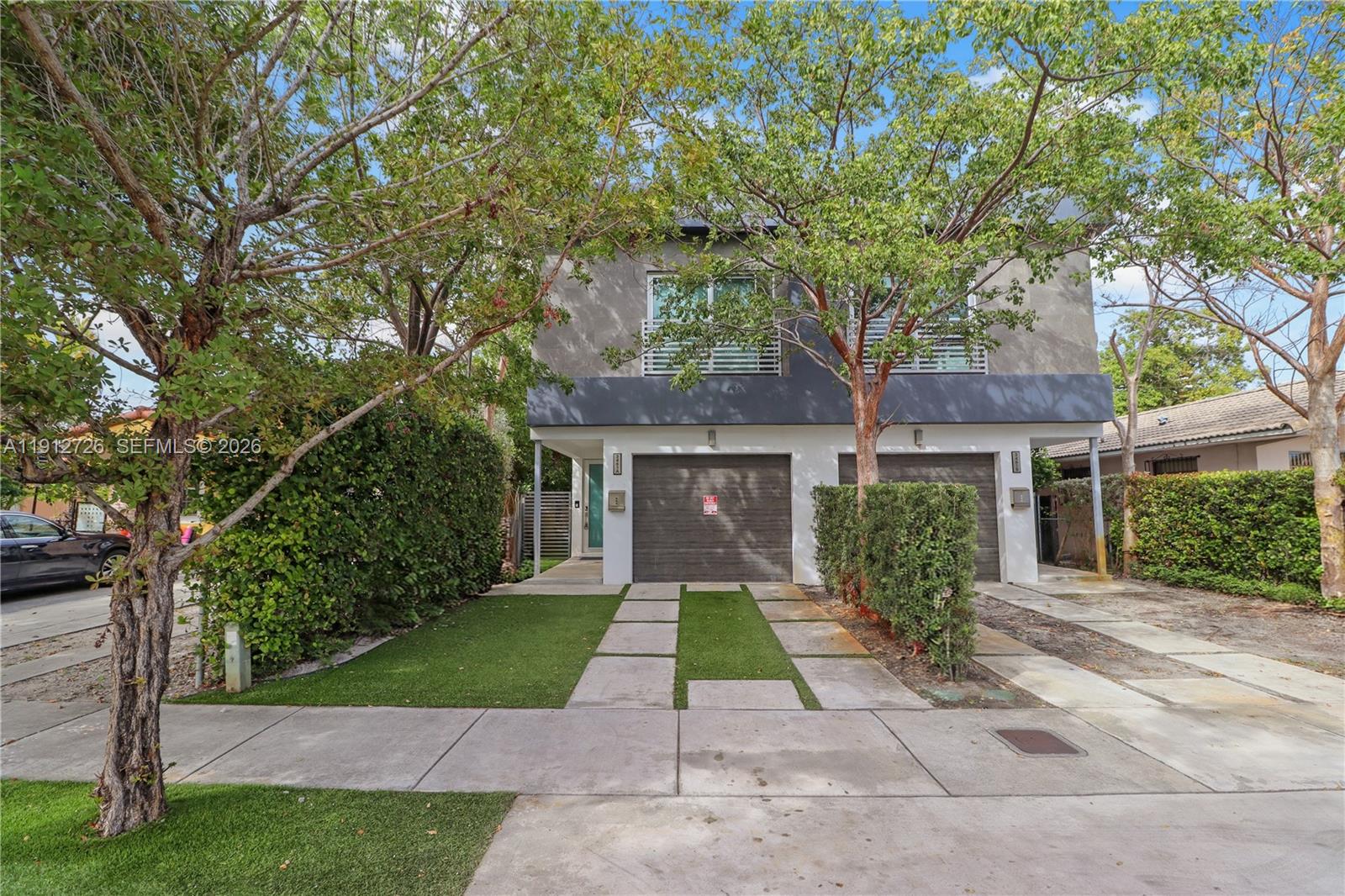 3461 Southwest 25th Street, Unit A Miami, FL 33133 - Photo 27 of 27 a front view of house with yard