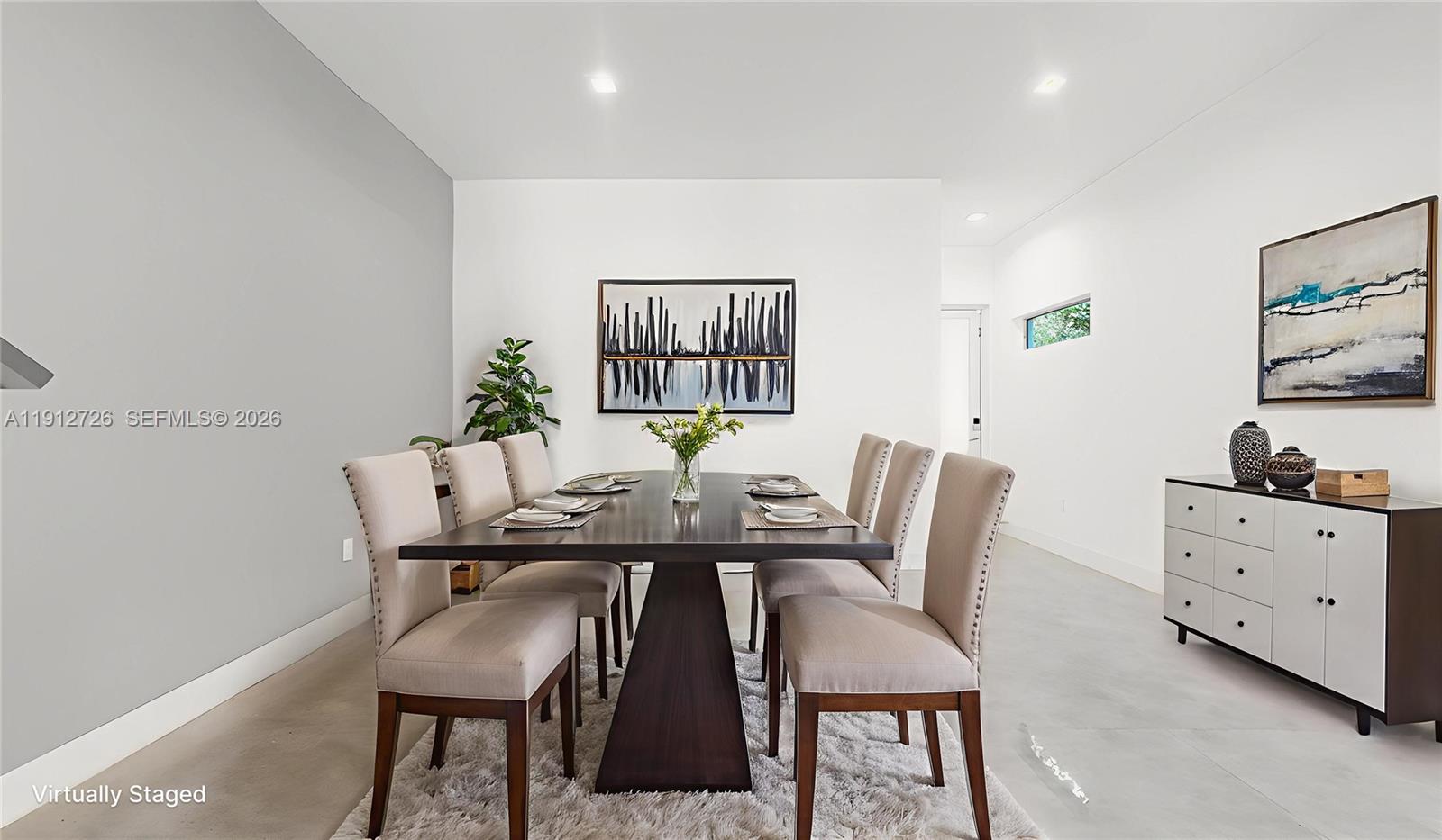 3461 Southwest 25th Street, Unit A Miami, FL 33133 - Photo 6 of 27 a view of a dining room with furniture