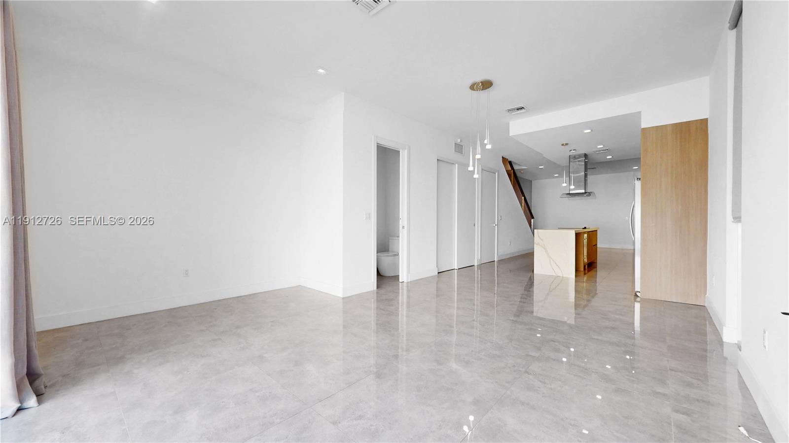 3461 Southwest 25th Street, Unit A Miami, FL 33133 - Photo 9 of 27 a view of an empty room