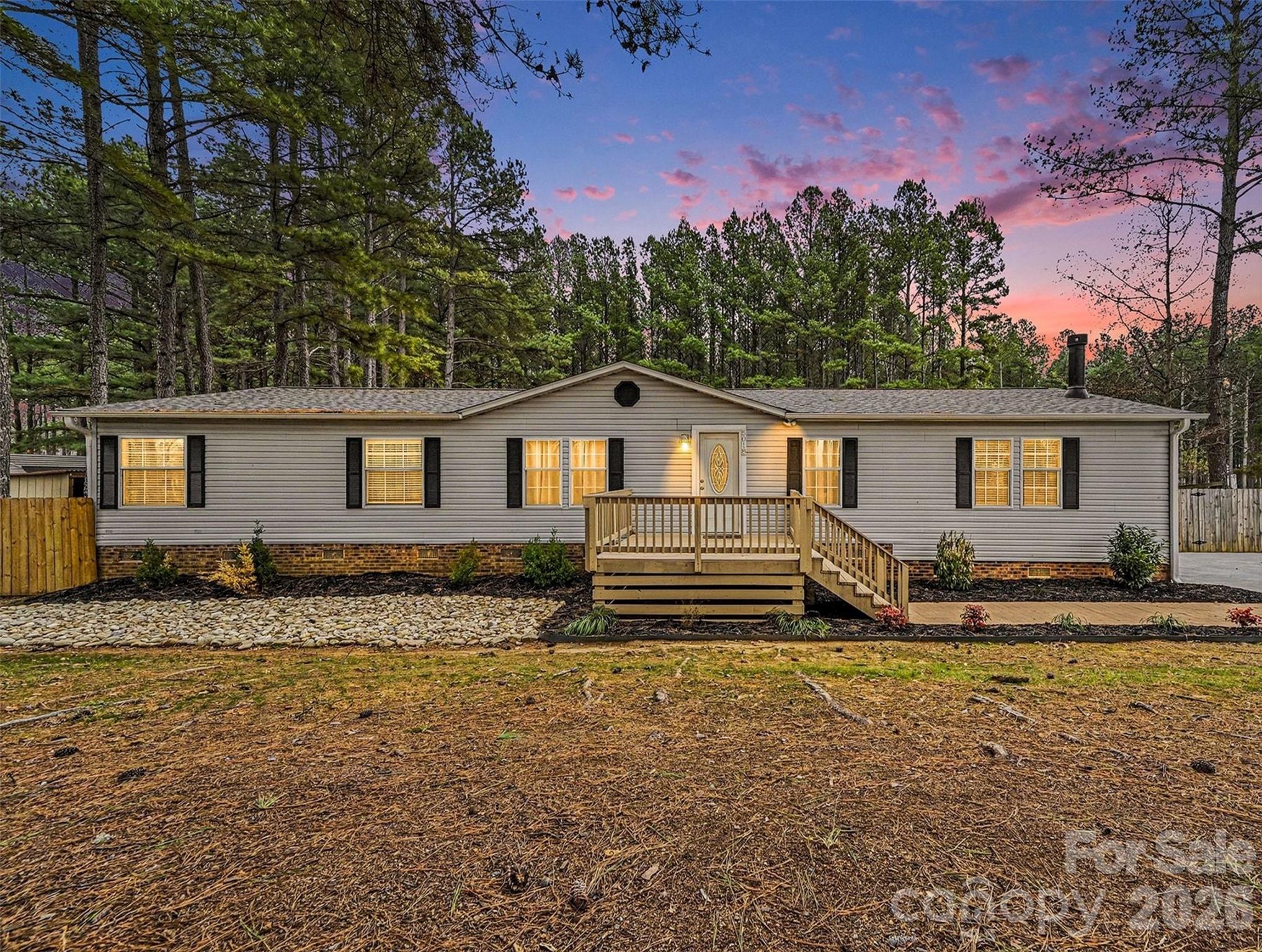 5018 Duncan Road Monroe, NC 28110 - Photo 1 of 33 a front view of a house with yard