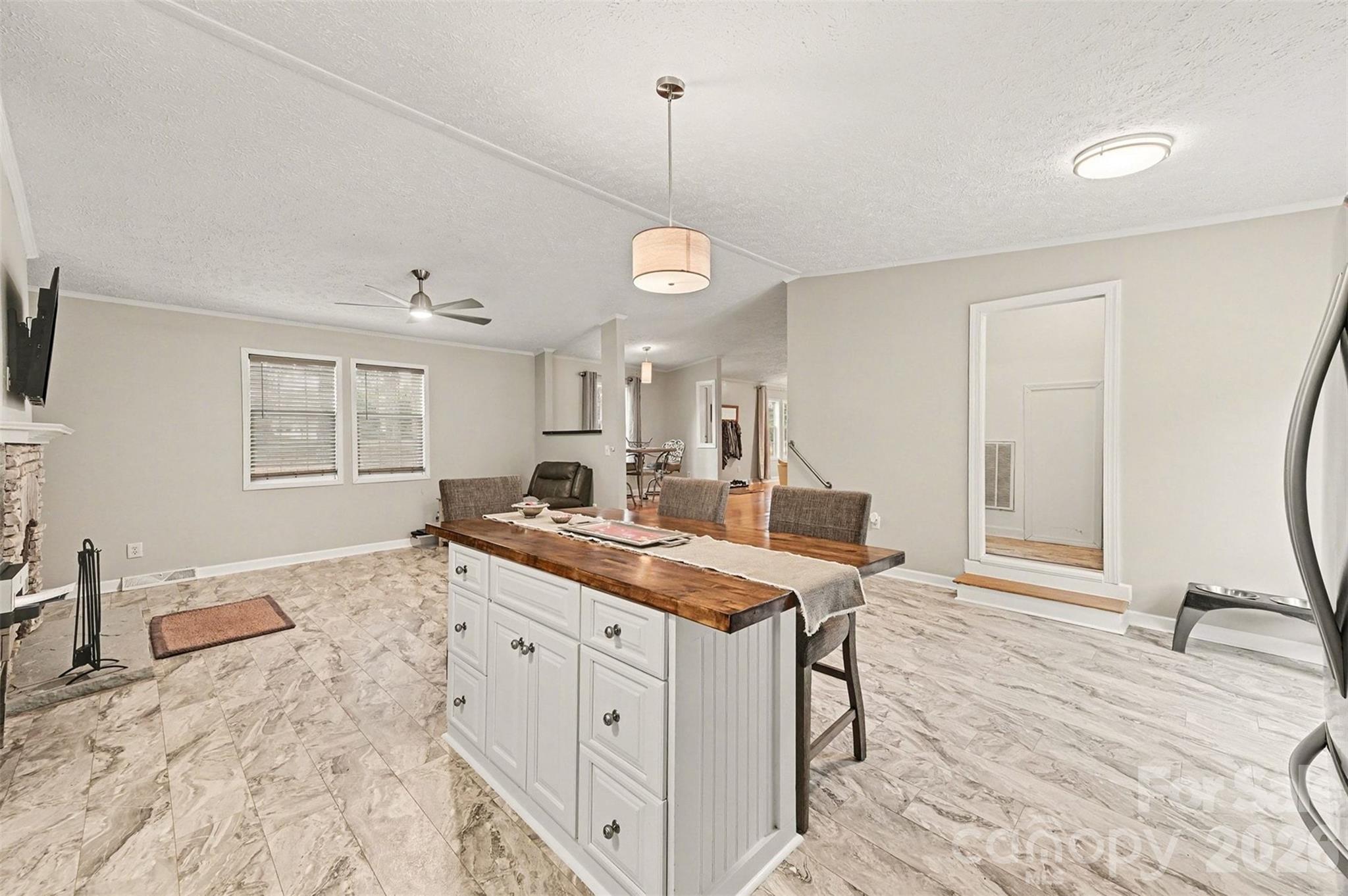 5018 Duncan Road Monroe, NC 28110 - Photo 13 of 33 a spacious bathroom with a granite countertop sink a mirror and a bath tub