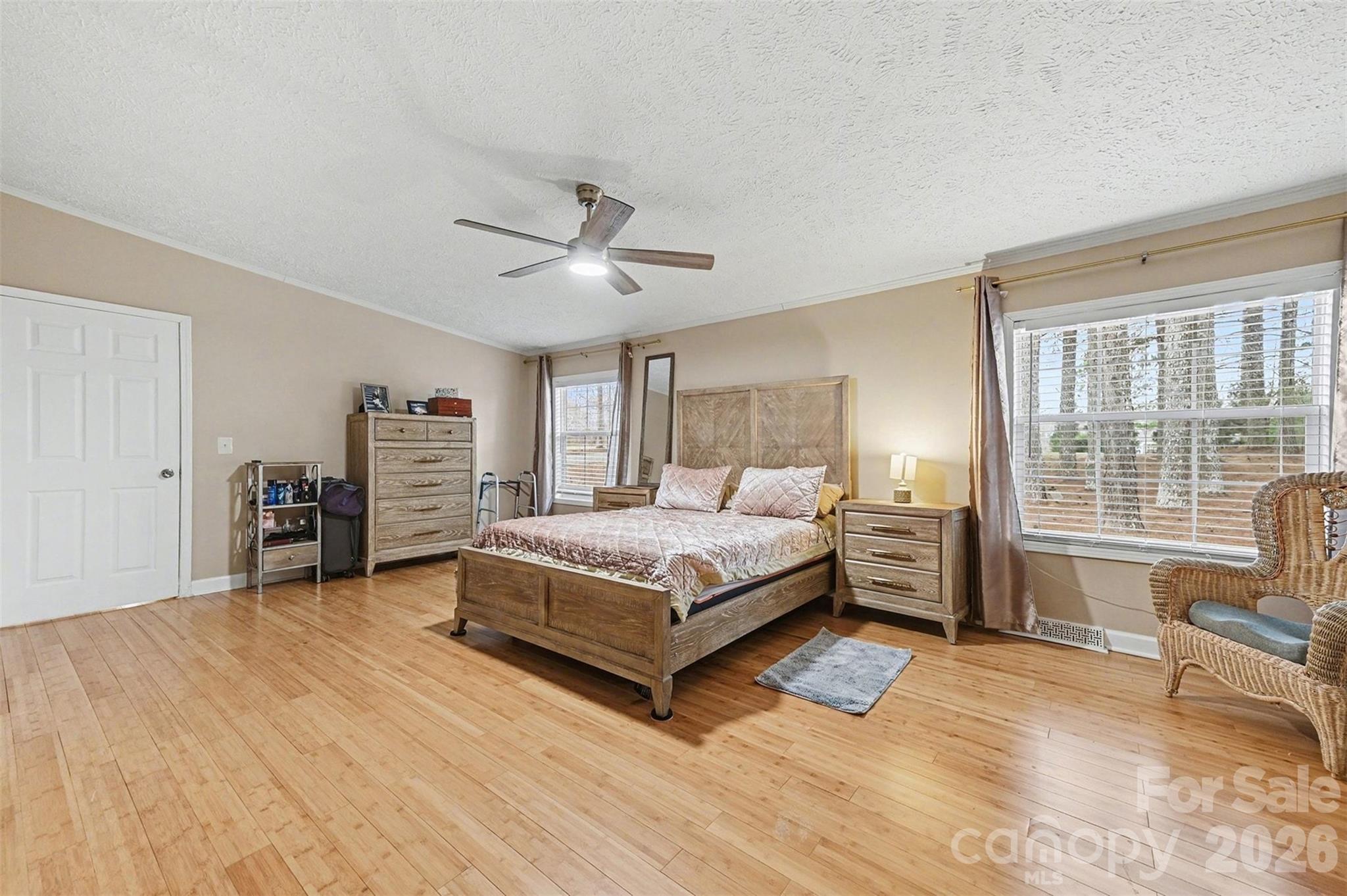 5018 Duncan Road Monroe, NC 28110 - Photo 19 of 33 a bedroom with a bed window and a table