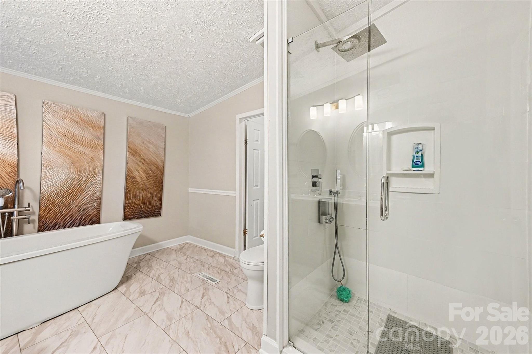 5018 Duncan Road Monroe, NC 28110 - Photo 23 of 33 a bathroom with a shower and a sink