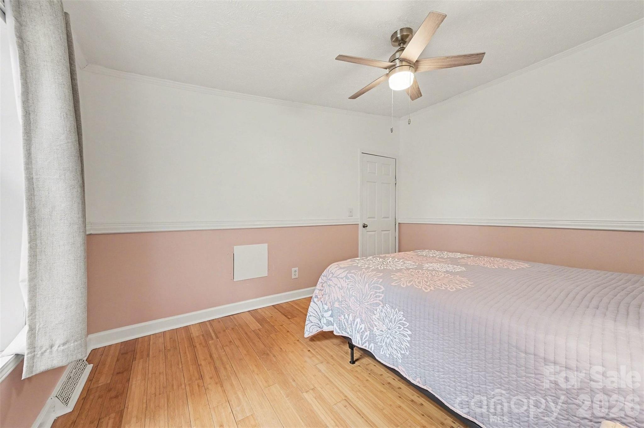 5018 Duncan Road Monroe, NC 28110 - Photo 26 of 33 a bedroom with a bed and a ceiling fan