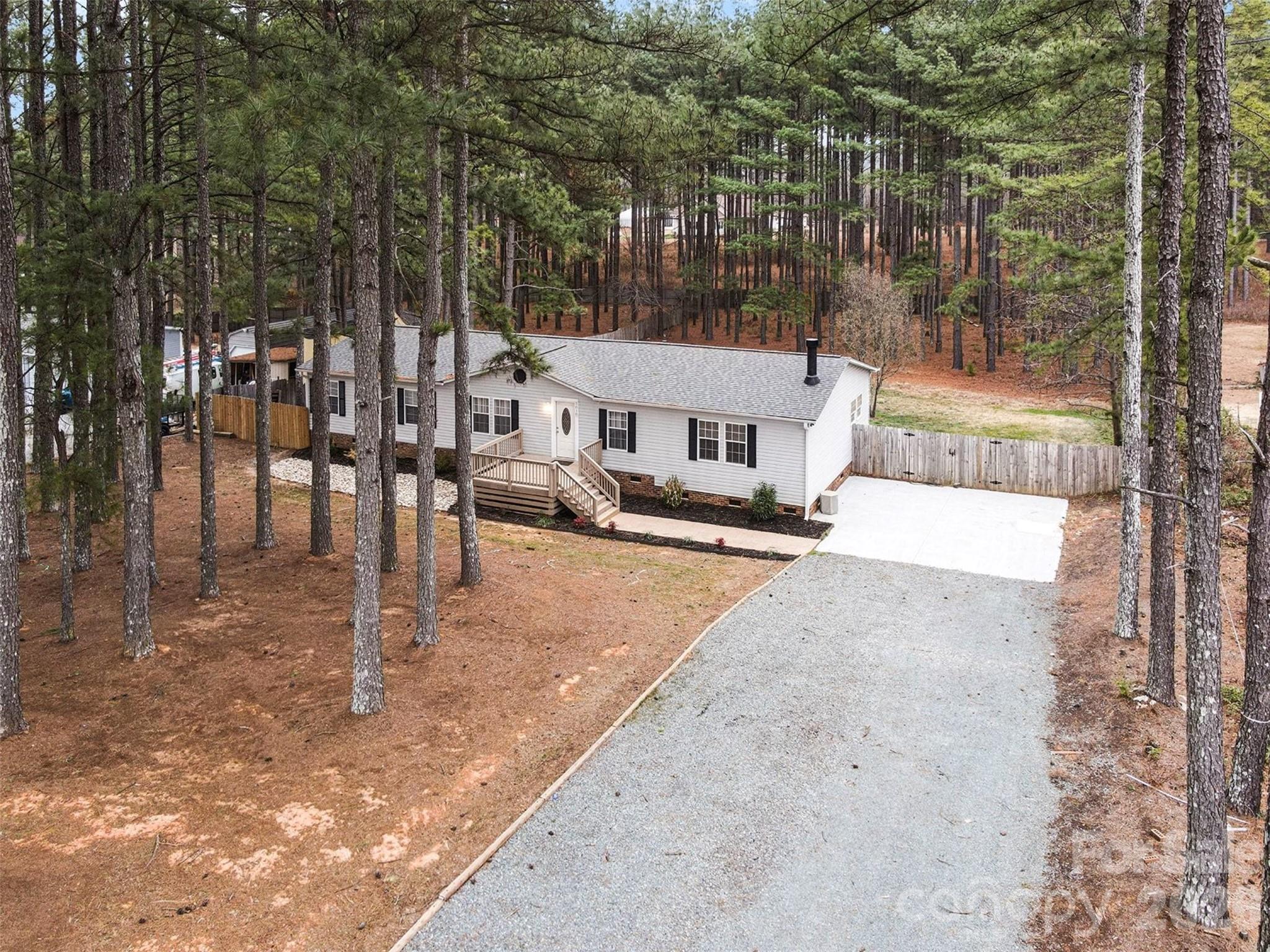 5018 Duncan Road Monroe, NC 28110 - Photo 32 of 33 a view of a house with a yard
