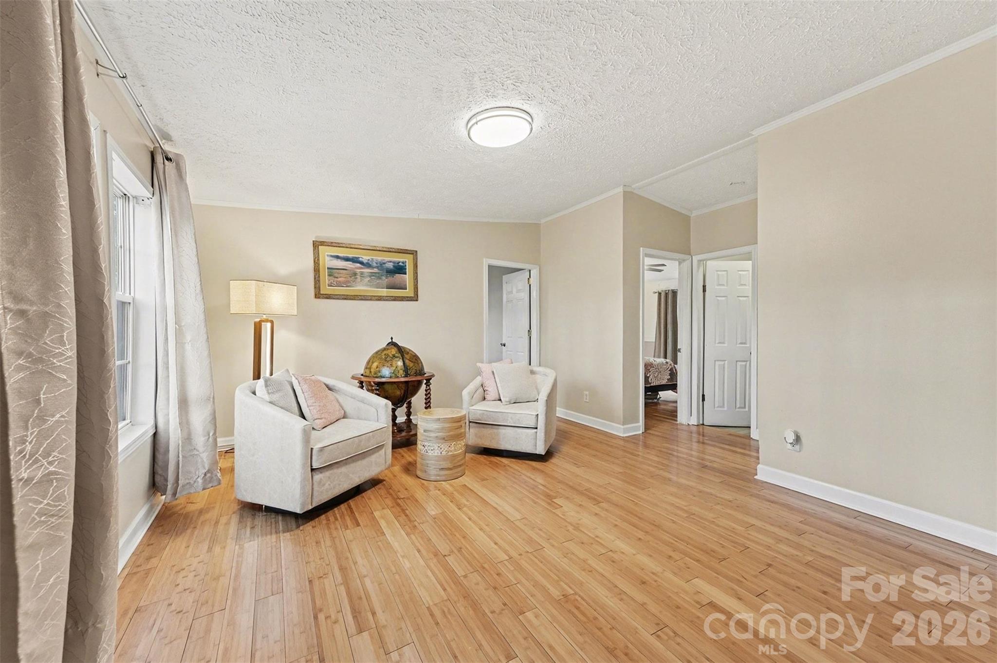 5018 Duncan Road Monroe, NC 28110 - Photo 8 of 33 a living room with furniture and a wooden floor