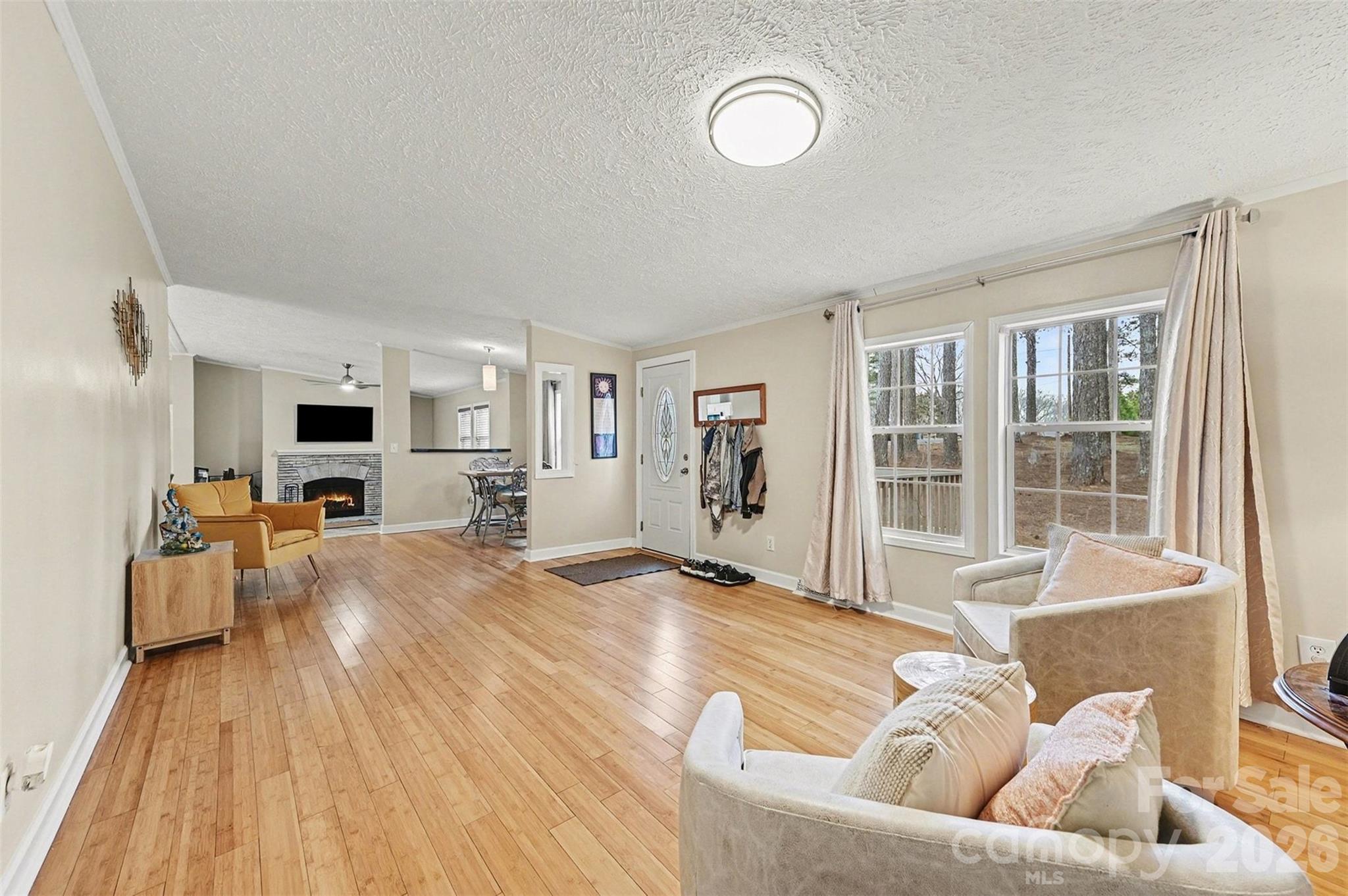 5018 Duncan Road Monroe, NC 28110 - Photo 9 of 33 a living room with furniture and a flat screen tv