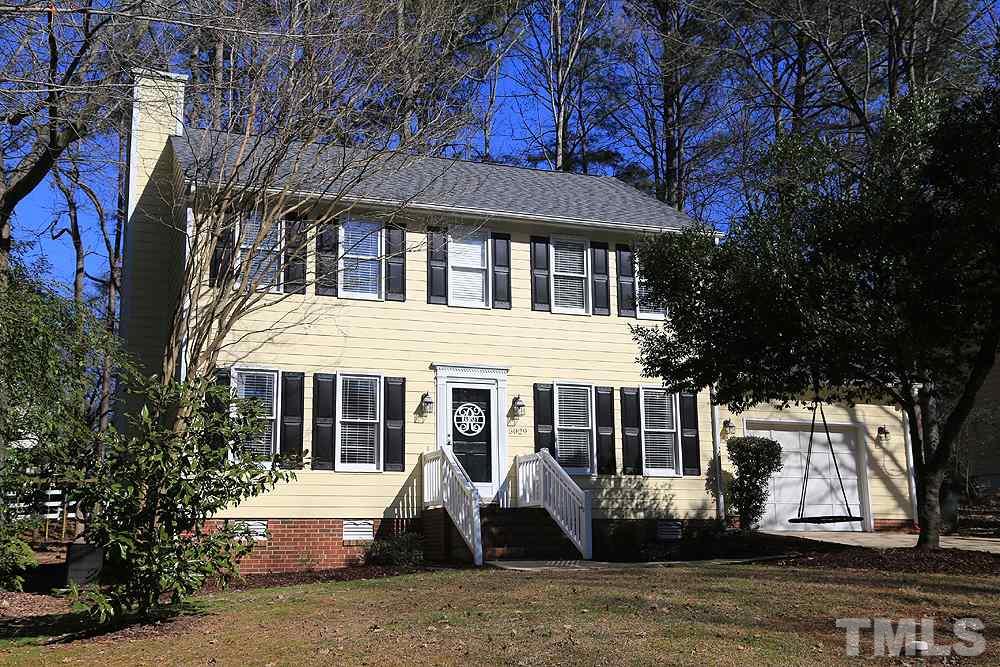 5029 Denham Court Raleigh, NC 27613 - Photo 1 of 13 a front view of a house with a yard