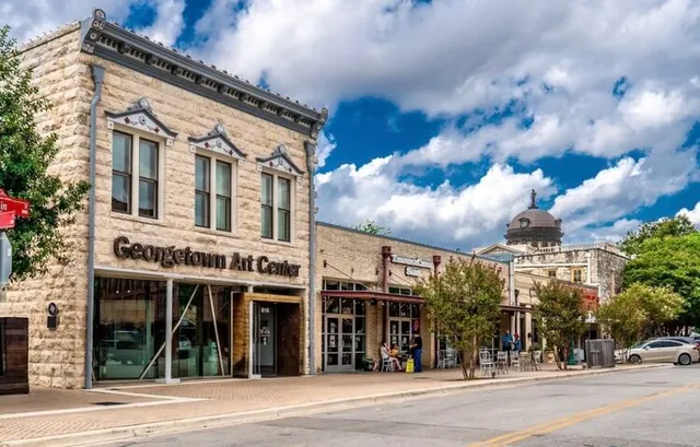 a view of a building with a street