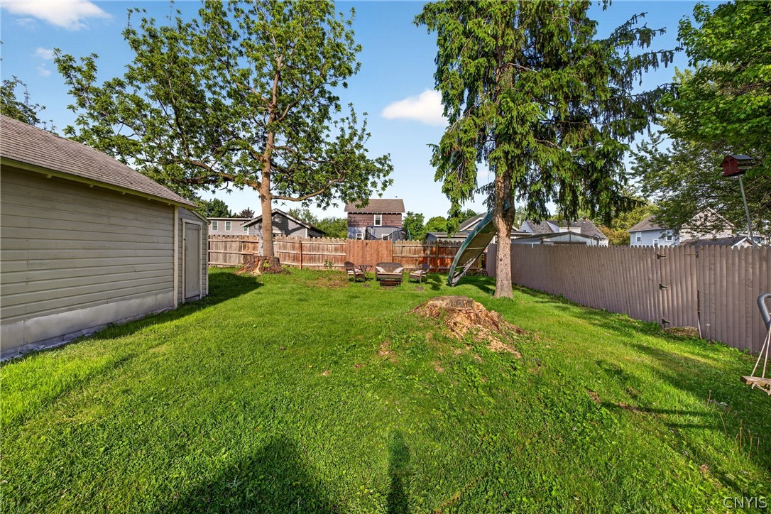 305 Newcastle Road Geddes, NY 13219 - Photo 25 of 29 The really DEEP backyard! And a glimpse of the Ga