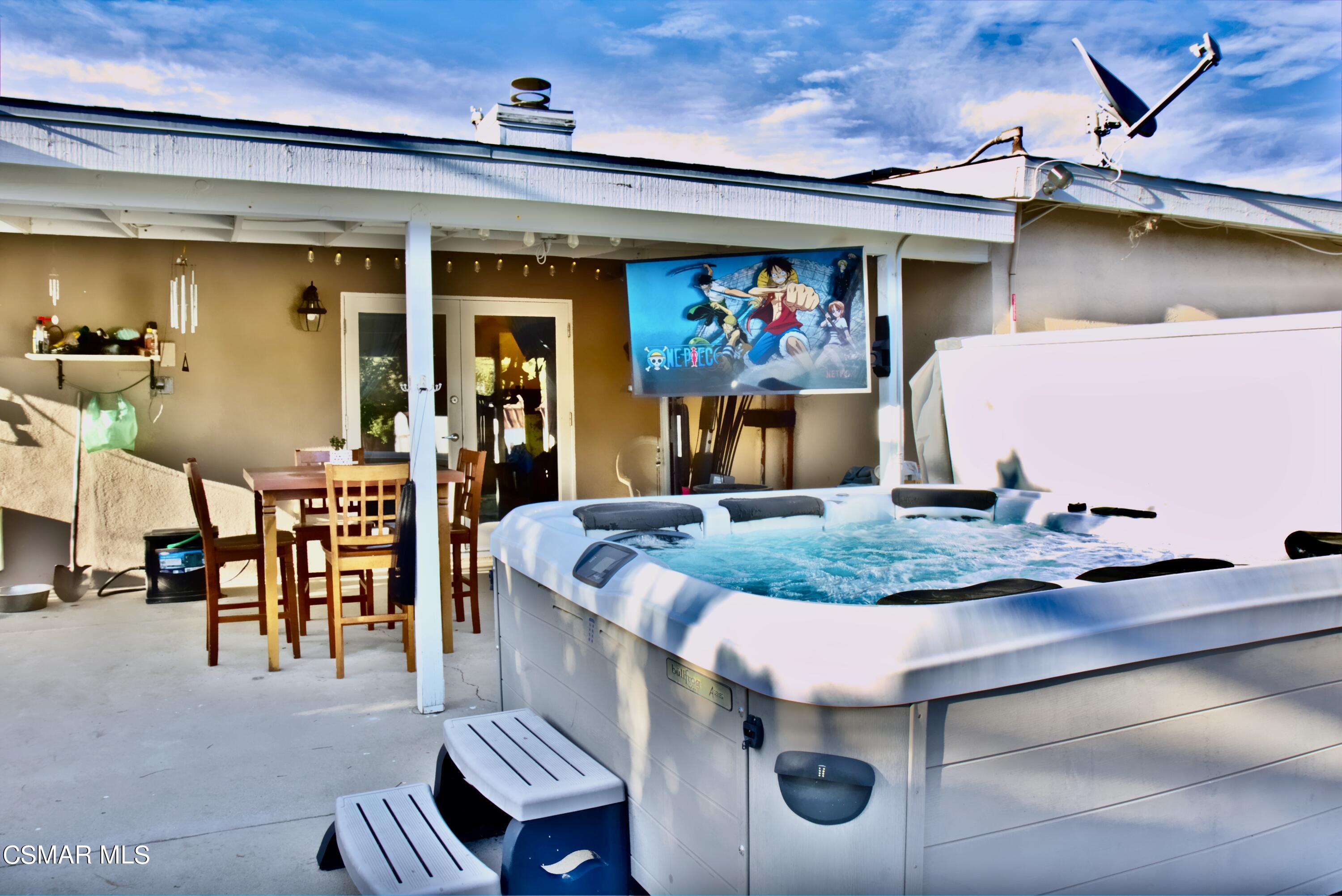 4306 Shopping Lane Simi Valley, CA 93063 - Photo 13 of 15 a view of a chairs and table in a patio