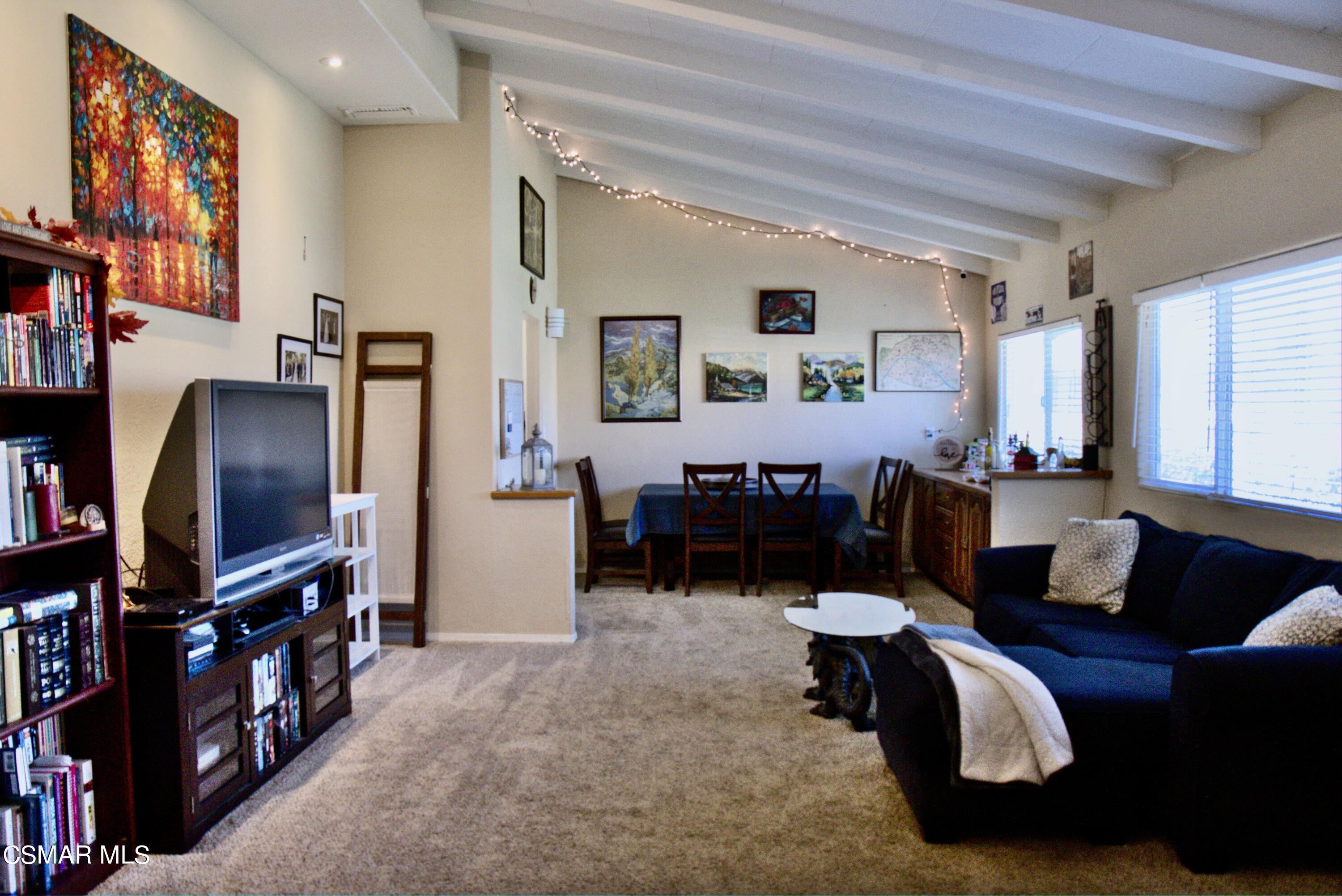 4306 Shopping Lane Simi Valley, CA 93063 - Photo 2 of 15 a bedroom with furniture and a flat screen tv