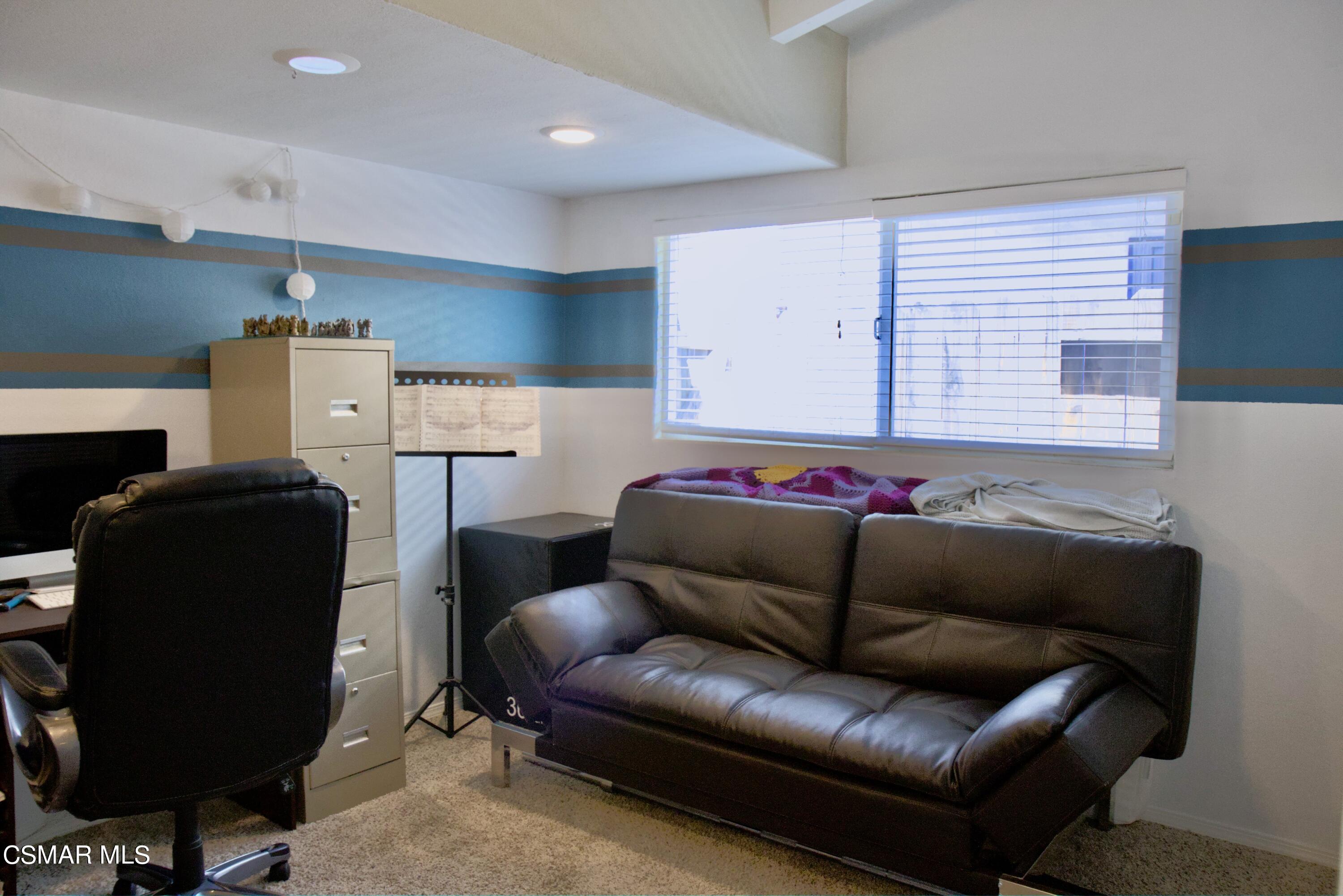 4306 Shopping Lane Simi Valley, CA 93063 - Photo 8 of 15 a bedroom with furniture and a couch