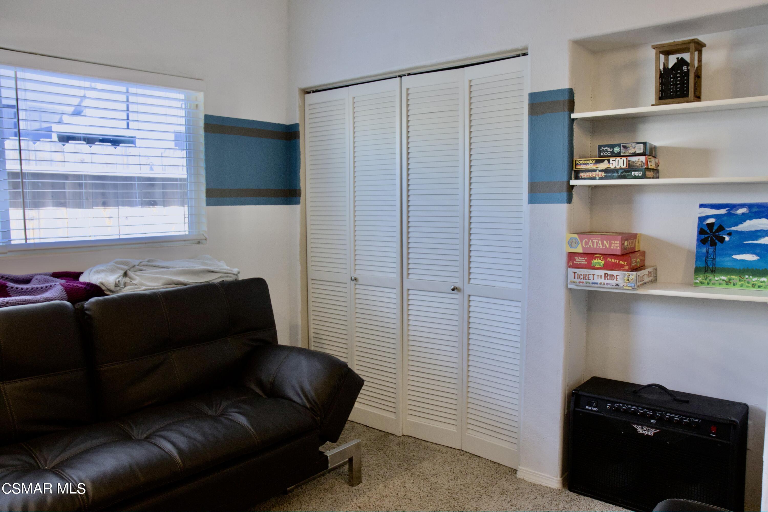 4306 Shopping Lane Simi Valley, CA 93063 - Photo 9 of 15 a living room with a couch and a window