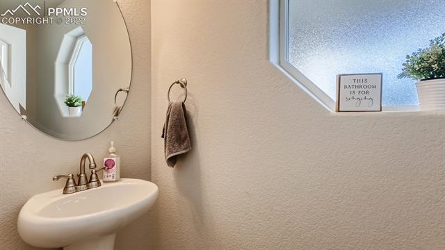 6182 Jorie Road Colorado Springs, CO 80927 - Photo 14 of 28 Main Level Powder Bath