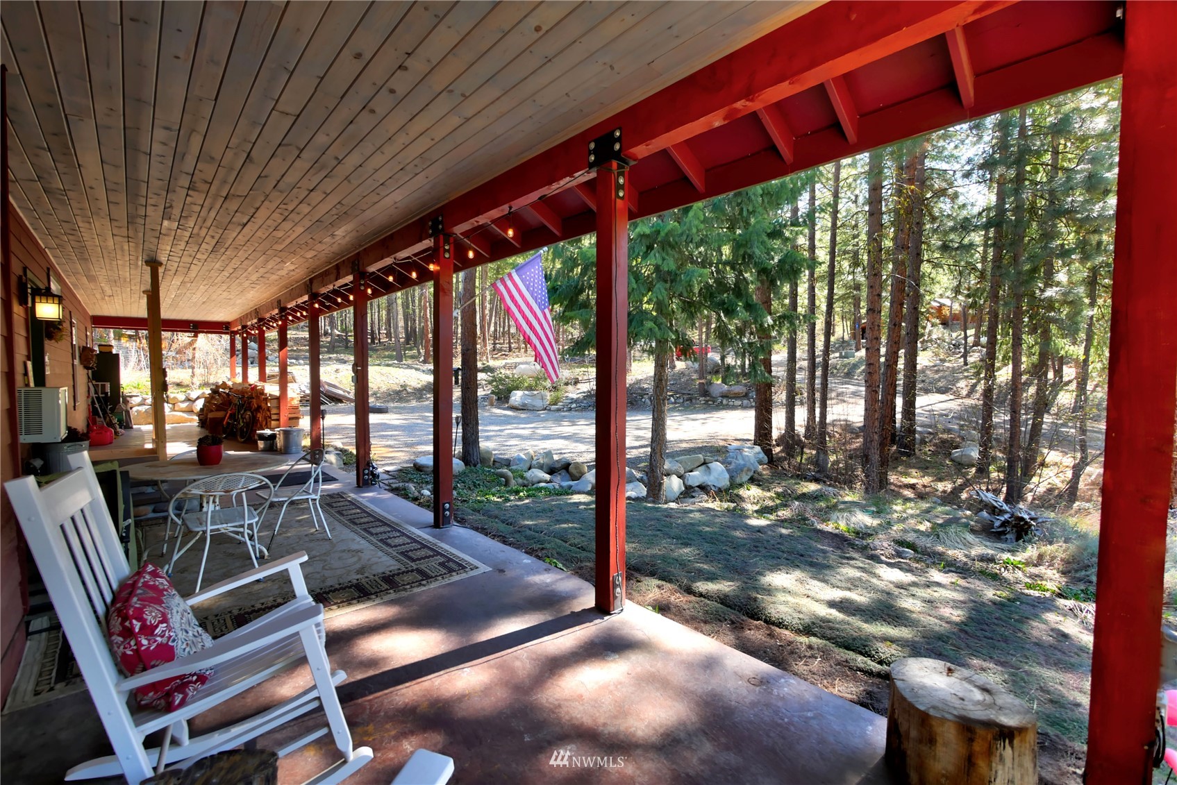 17 Highland Road Winthrop, WA 98862 - Photo 25 of 40 a patio with yard glass top table and chairs