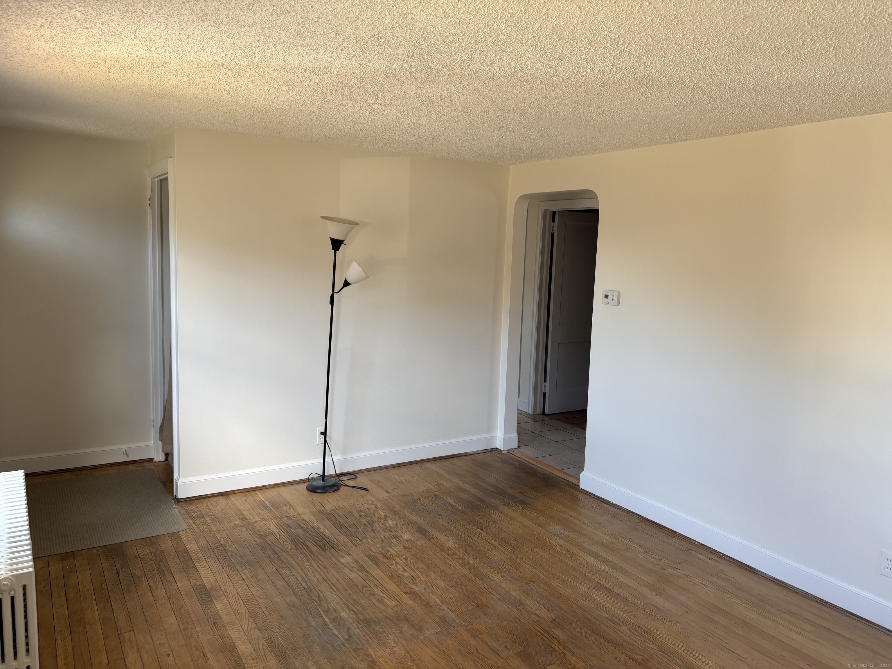 85 Benton Street Manchester, CT 06040 - Photo 6 of 34 a view of a livingroom with wooden floor