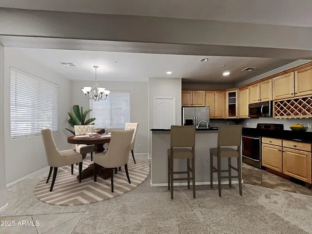 a view of a dining room with furniture