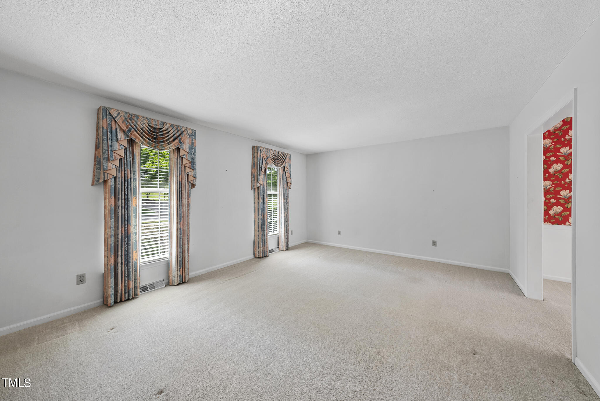 5213 Old Forge Circle Raleigh, NC 27609 - Photo 19 of 37 an empty room with windows