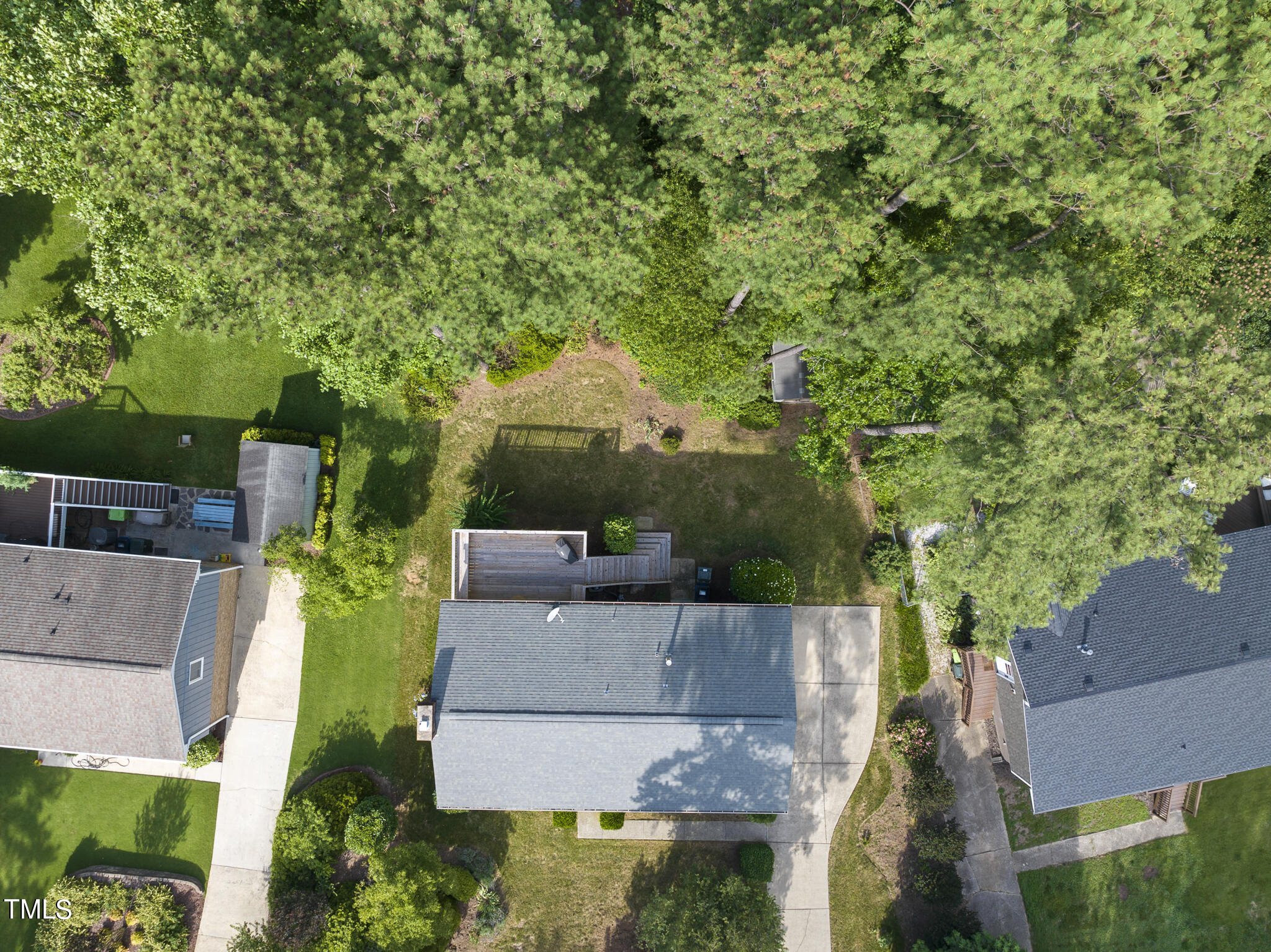 5213 Old Forge Circle Raleigh, NC 27609 - Photo 2 of 37 an aerial view of a house with a yard basket ball court and outdoor seating