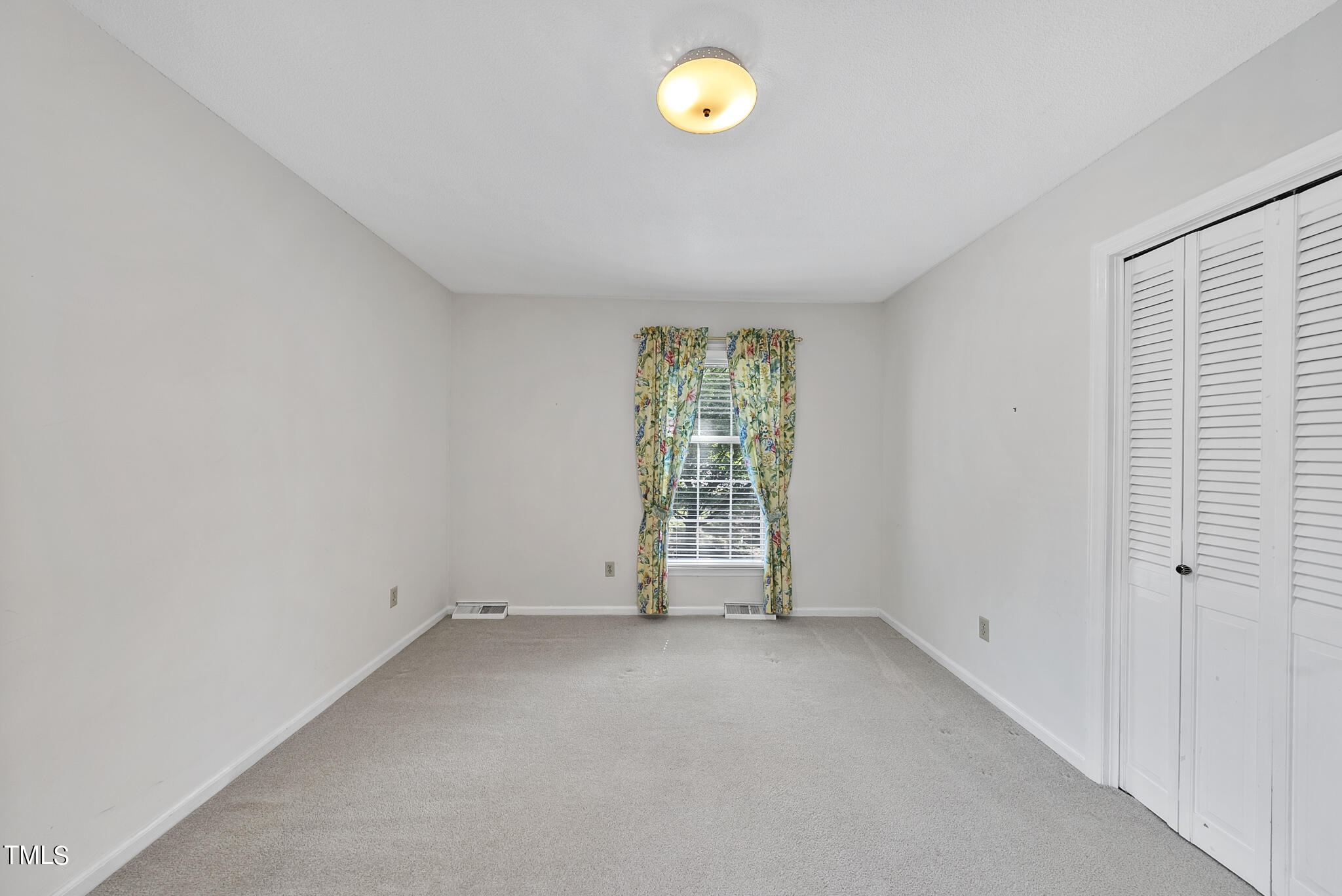 5213 Old Forge Circle Raleigh, NC 27609 - Photo 28 of 37 an empty room with windows