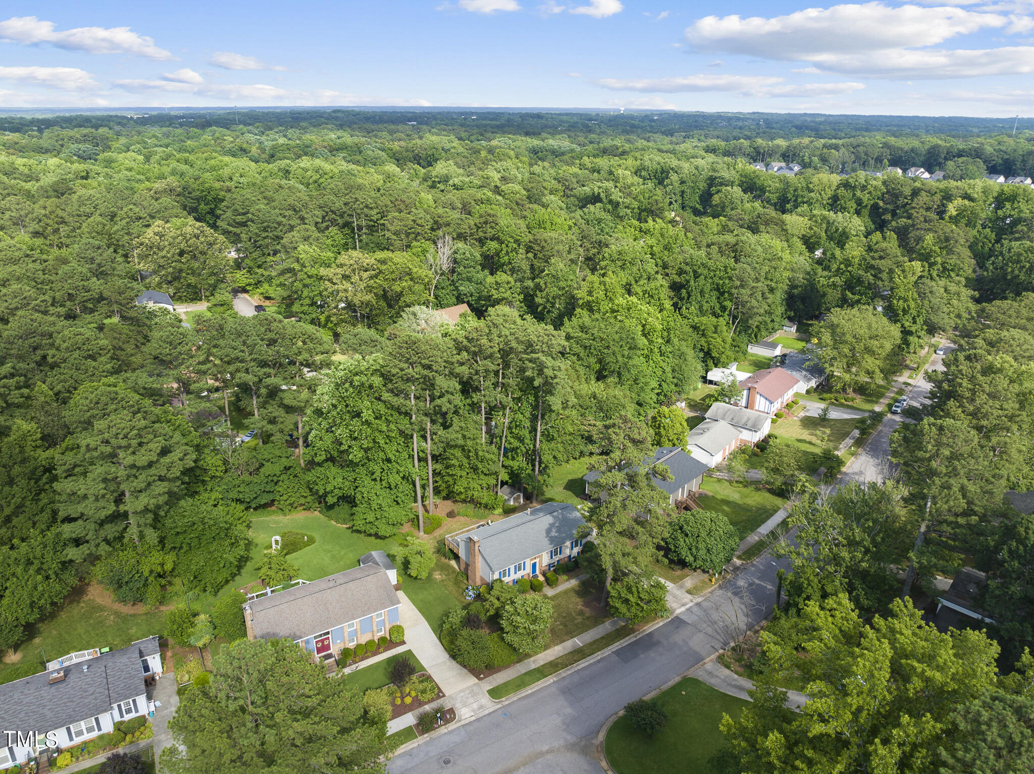 5213 Old Forge Circle Raleigh, NC 27609 - Photo 6 of 37 an aerial view of residential houses with outdoor space and trees