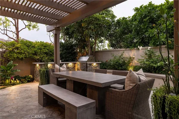 a view of balcony with furniture and outdoor seating