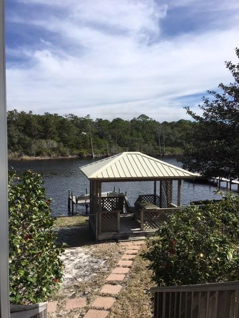 95 Blue Lake Road Santa Rosa Beach, FL 32459 - Photo 6 of 11 a view of a house with a patio