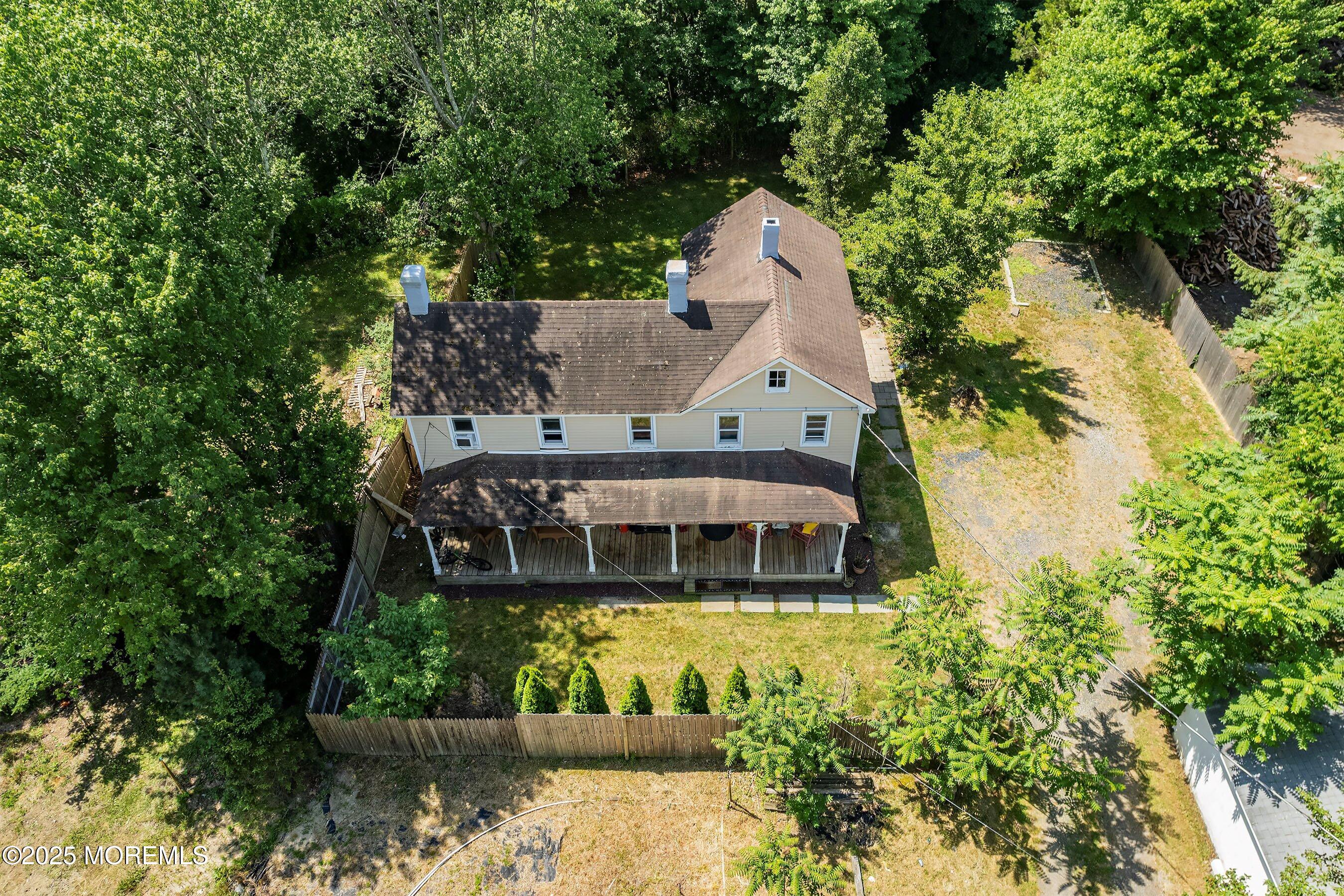 763 Hulses Corner Road Howell, NJ 07731 - Photo 13 of 34 an aerial view of a house with a yard and sitting area