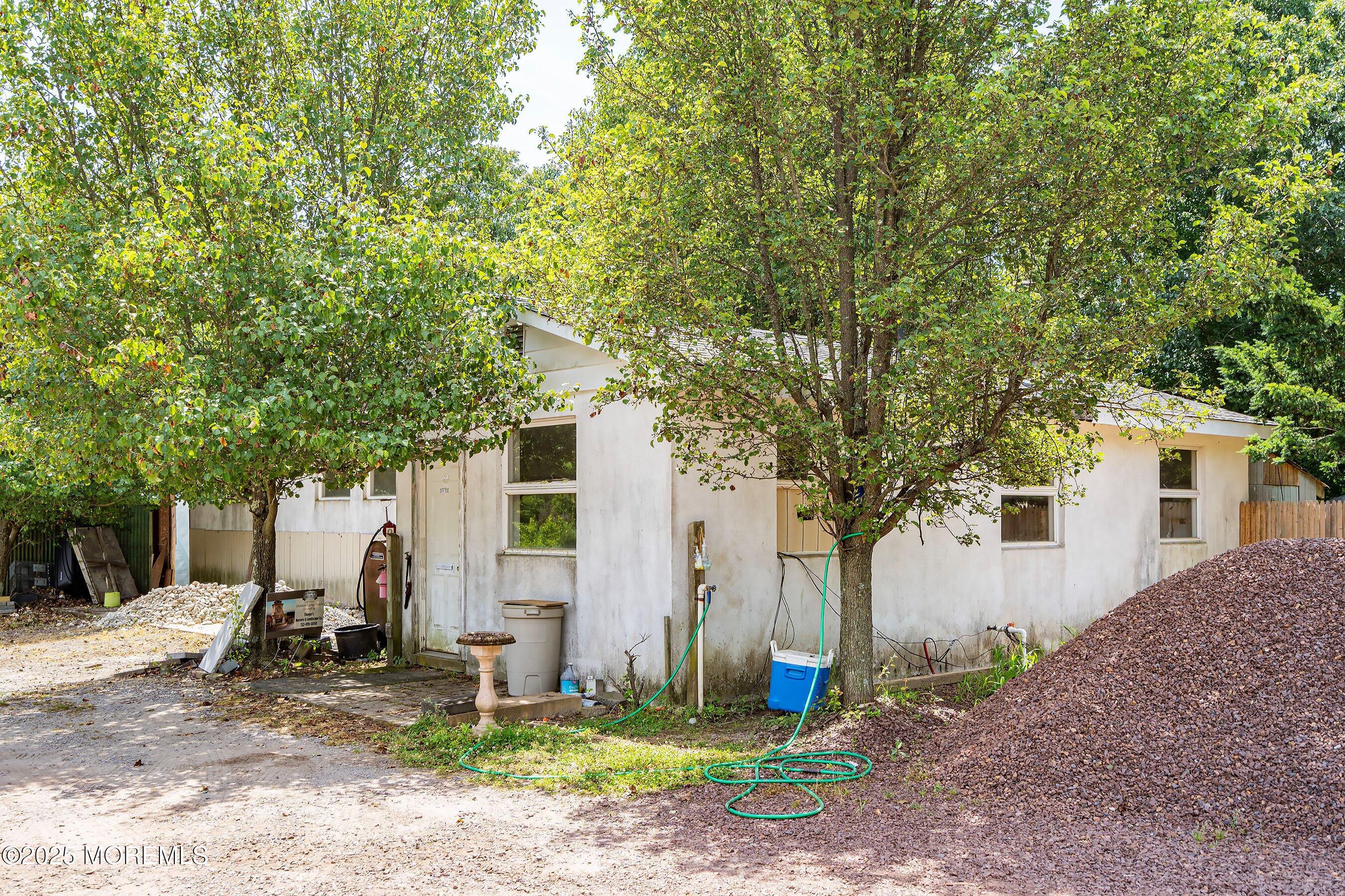 763 Hulses Corner Road Howell, NJ 07731 - Photo 15 of 34 a view of a house with backyard and trees