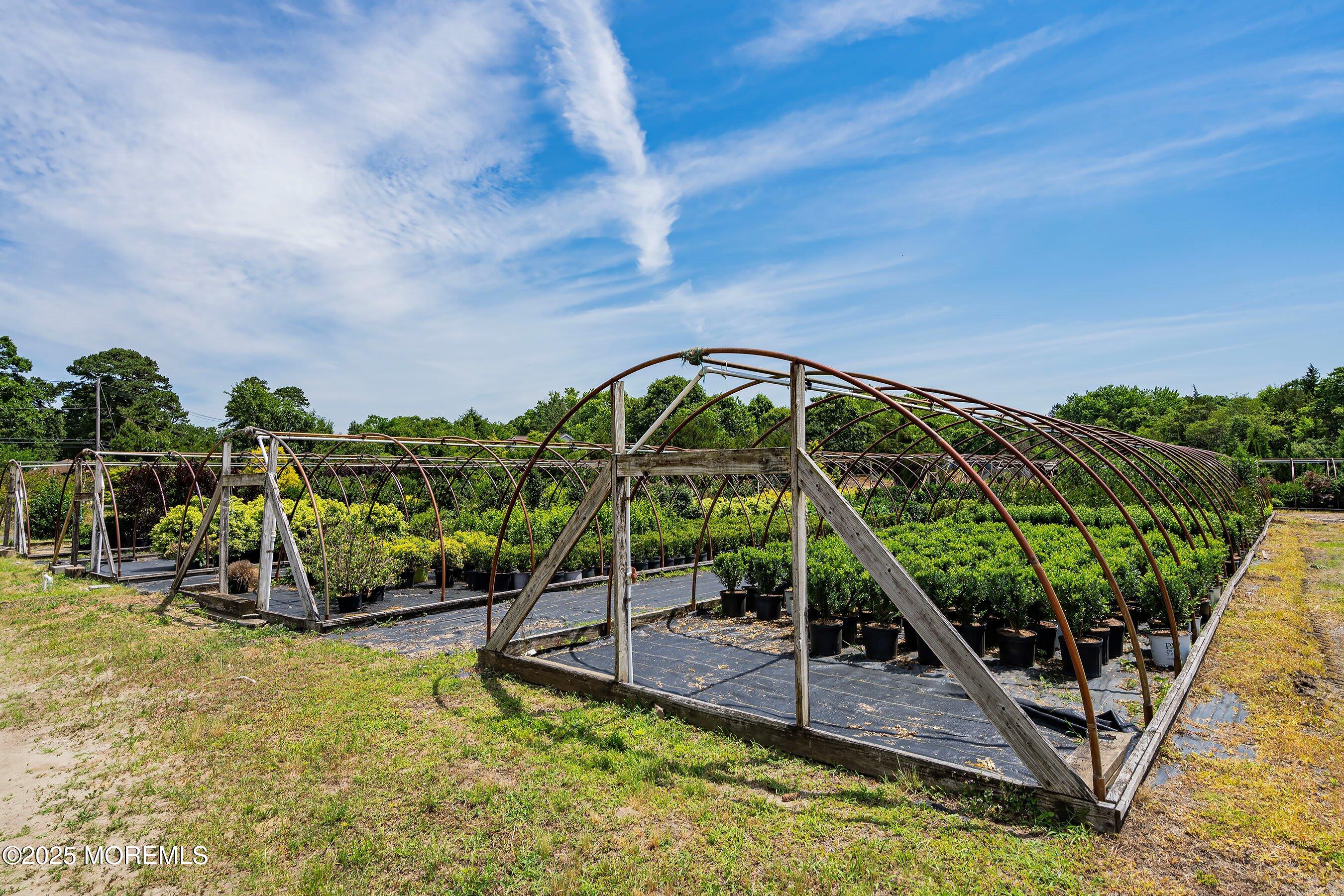 763 Hulses Corner Road Howell, NJ 07731 - Photo 17 of 34 a view of a swimming pool with a patio