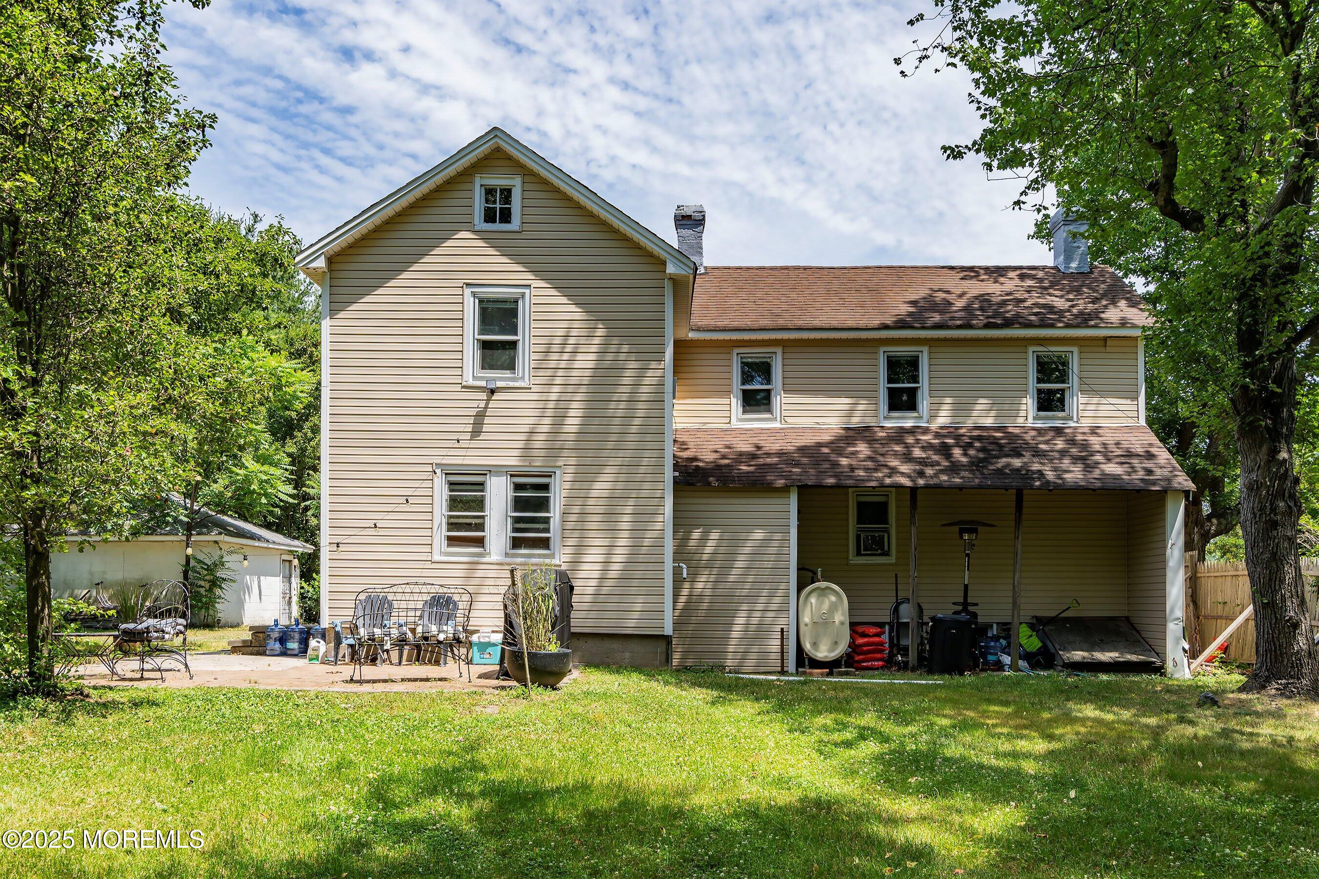 763 Hulses Corner Road Howell, NJ 07731 - Photo 20 of 34 a front view of a house with a yard and garage