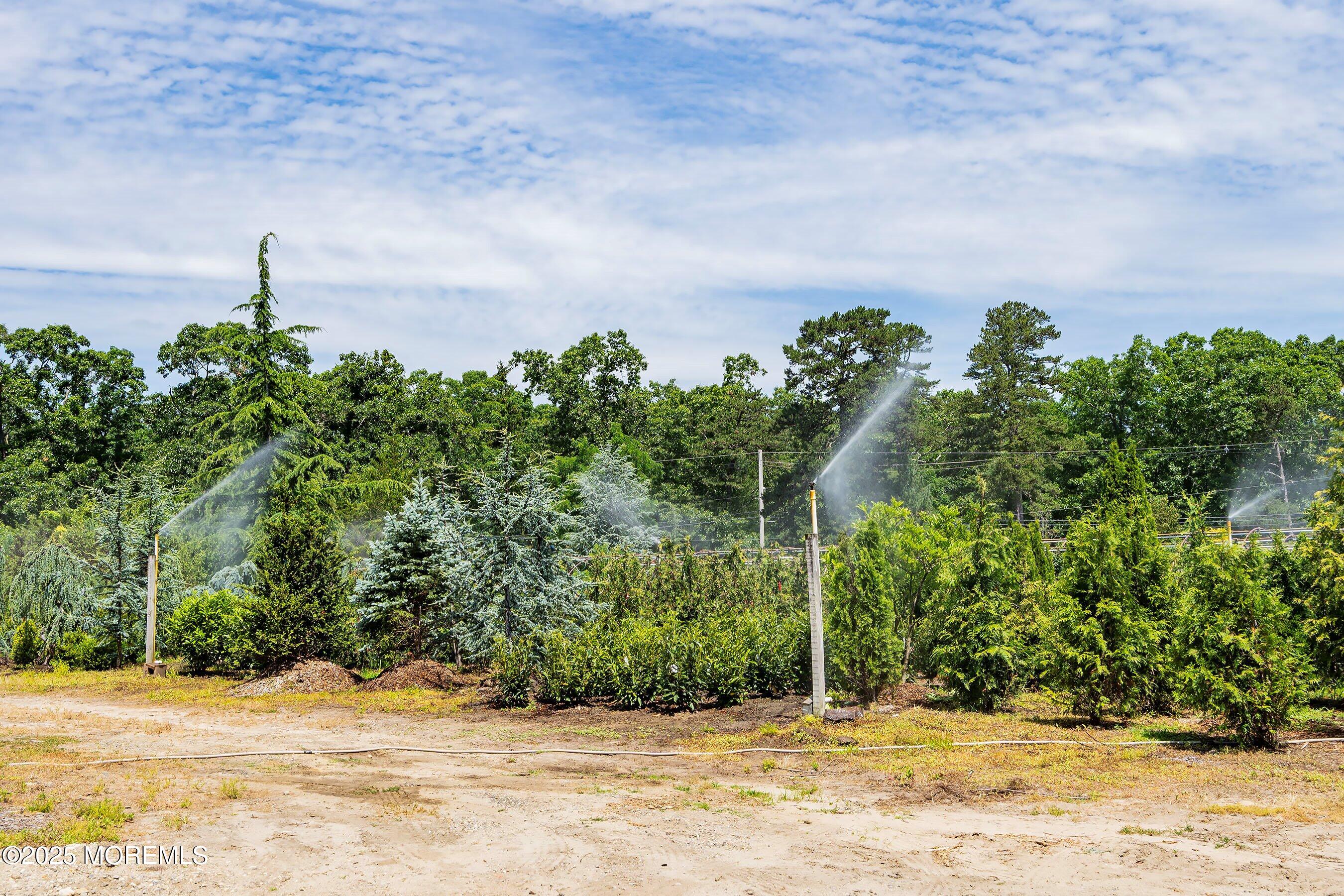 763 Hulses Corner Road Howell, NJ 07731 - Photo 24 of 34 a view of a house with a yard