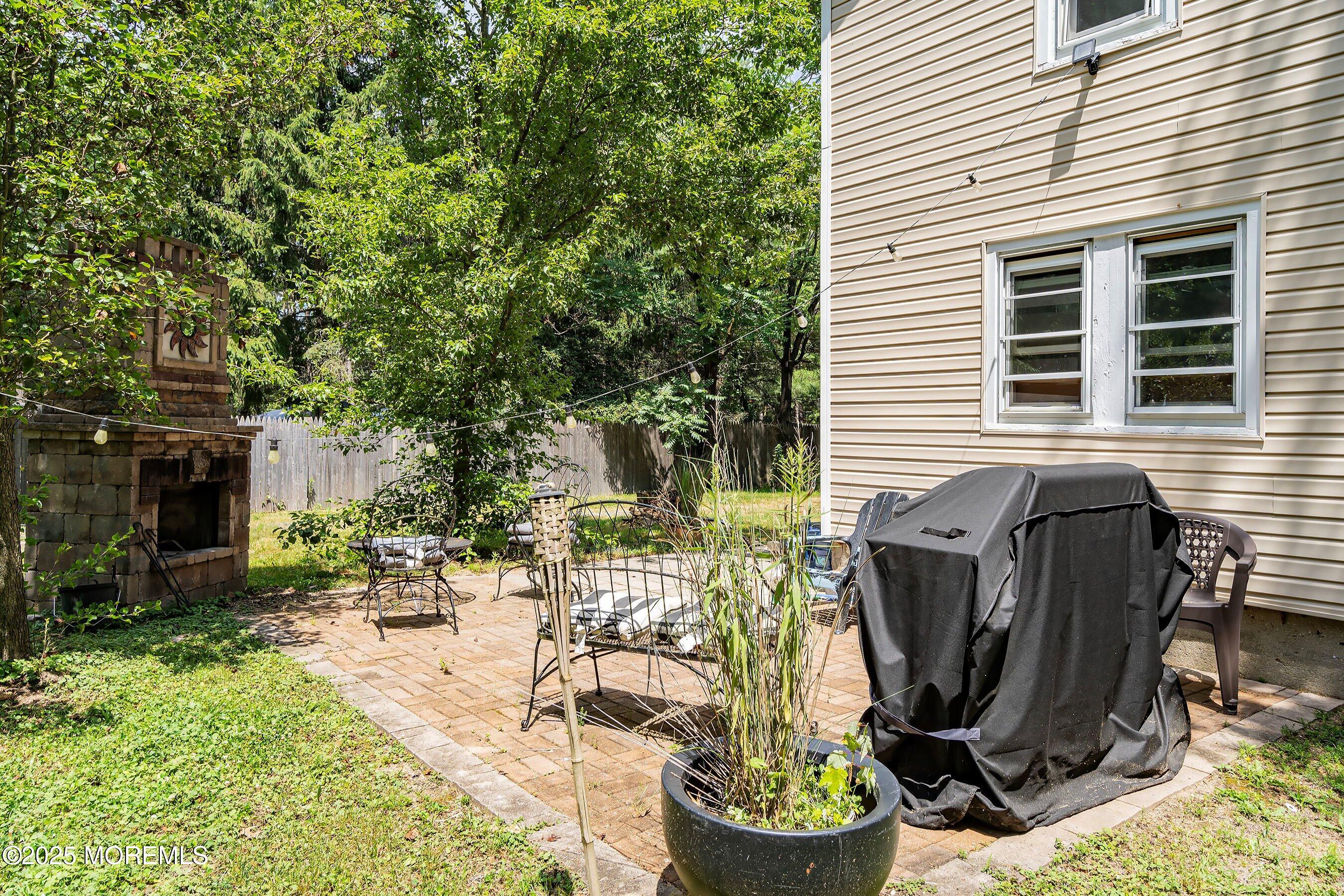 763 Hulses Corner Road Howell, NJ 07731 - Photo 29 of 34 a view of a backyard with sitting area and furniture