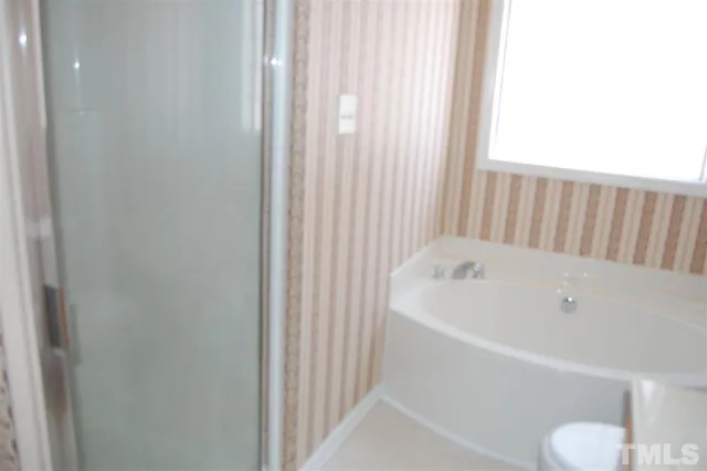 a bathroom with a bathtub