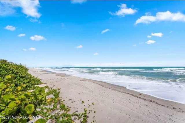 a view of beach and ocean view