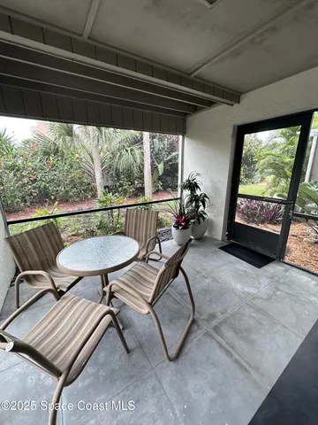 a view of a living room and a furniture