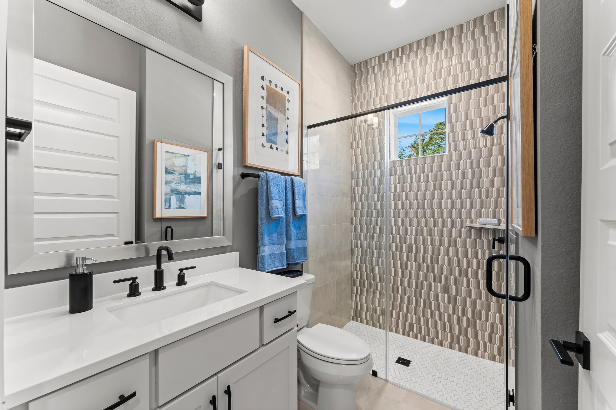 322 Marsh Wren Way Magnolia, TX 77354 - Photo 8 of 19 a bathroom with a sink a toilet and shower