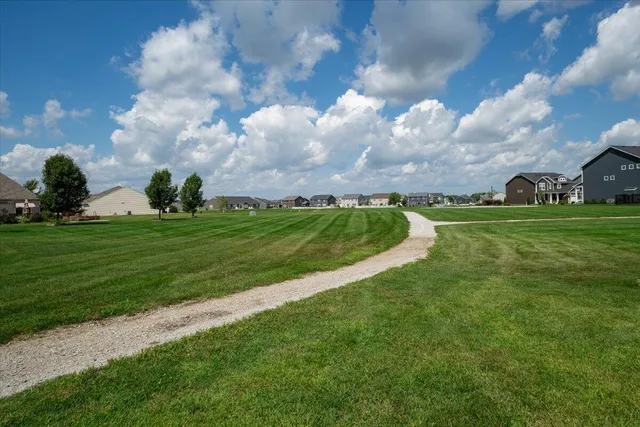 a view of a golf course with a garden