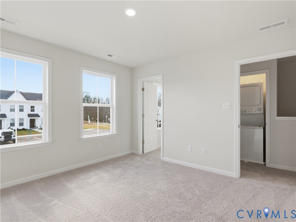 334 Mt Mccauley Way Aylett, VA 23009 - Photo 12 of 20 a view of an empty room with a window