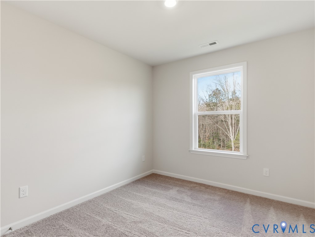 334 Mt Mccauley Way Aylett, VA 23009 - Photo 15 of 20 an empty room with a window