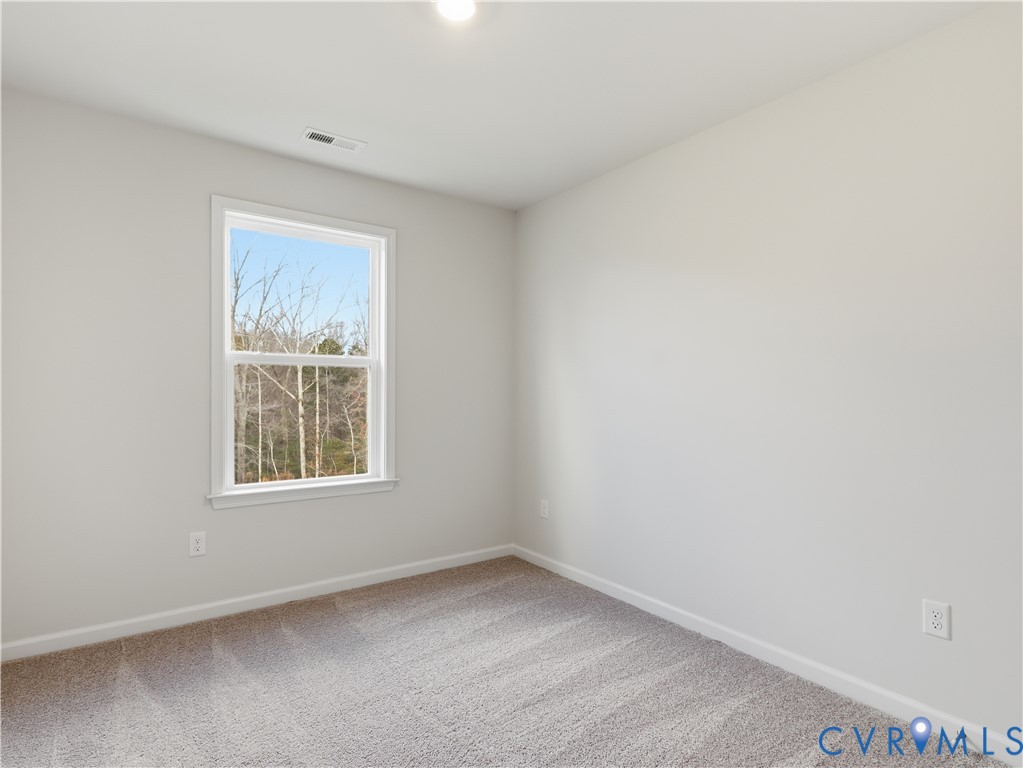 334 Mt Mccauley Way Aylett, VA 23009 - Photo 17 of 20 an empty room with a window