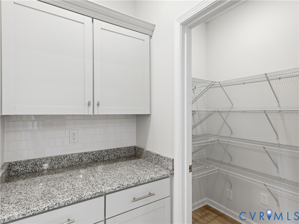 334 Mt Mccauley Way Aylett, VA 23009 - Photo 7 of 20 a kitchen with a sink and cabinets