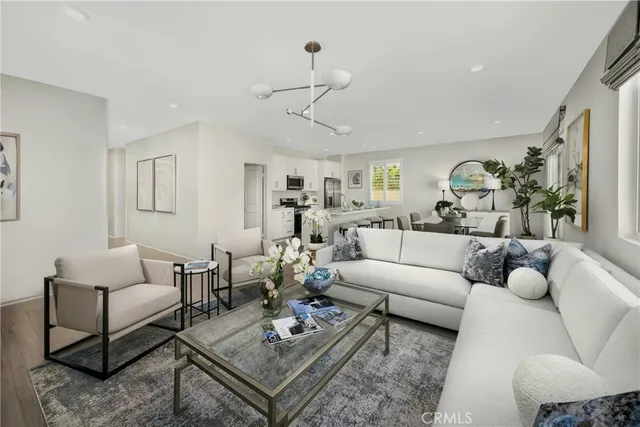 a living room with furniture or couch and a table