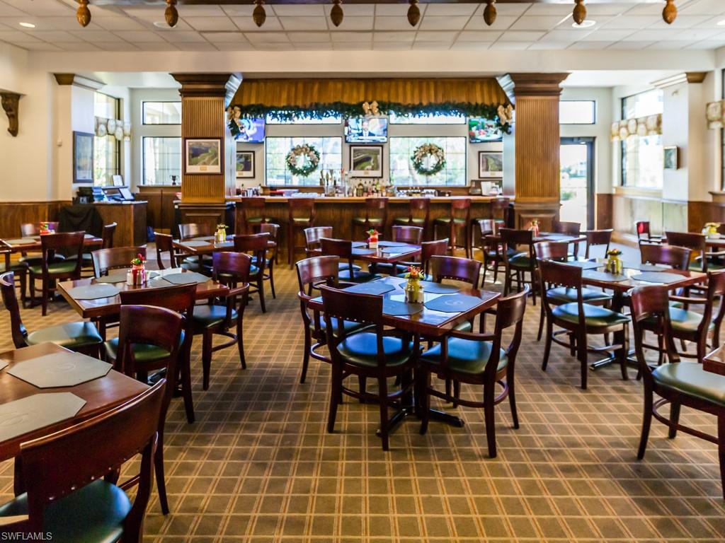 20117 Seadale Court Estero, FL 33928 - Photo 16 of 35 a group of people sitting in a living room