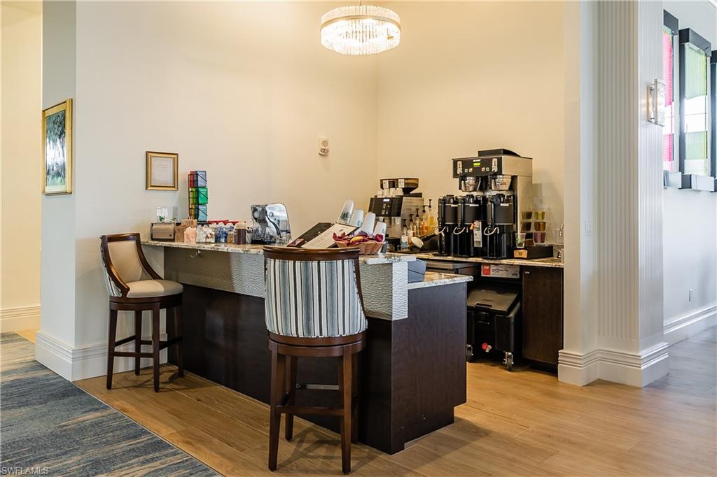 20117 Seadale Court Estero, FL 33928 - Photo 28 of 35 a view of a dining room with furniture