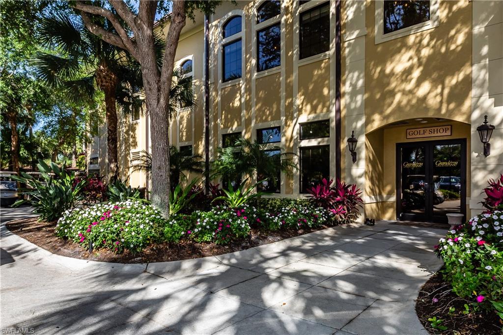 20117 Seadale Court Estero, FL 33928 - Photo 31 of 35 a view of a house with a flower garden