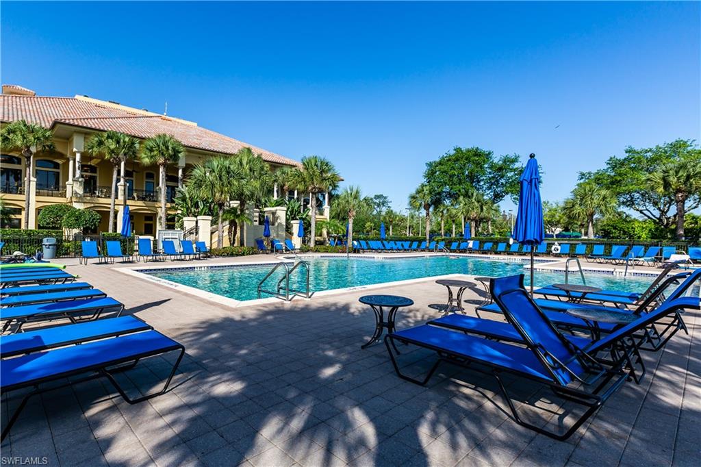 20117 Seadale Court Estero, FL 33928 - Photo 34 of 35 a view of a yard with swimming pool and sitting area