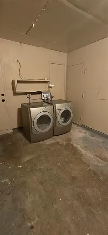 a kitchen with a cabinets and a stove top oven