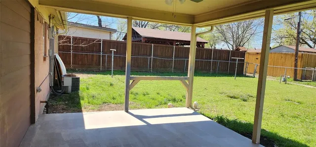 a view of a garage with washing machine